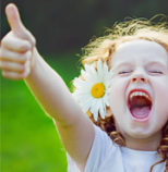 Say Yes! To Abundance and Change. Young girl with mouth wide open, happy, thumbs up